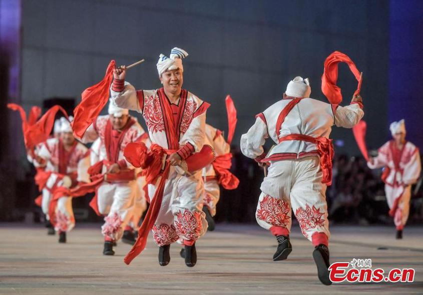 Artists from Tacheng Prefecture, northwest China's Xinjiang Uyghur Autonomous Region, perform a dance during the first folk art season in Urumqi, capital of Xinjiang, Aug. 20, 2024. (Photo: China News Service/Liu Xin)