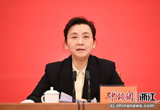 图为:浙江省委常委、统战部部长王文序出席会议并讲话。中新社记者 王刚 摄