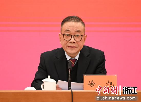 图为:浙江省委统战部常务副部长徐旭主持会议。中新社记者 王刚 摄