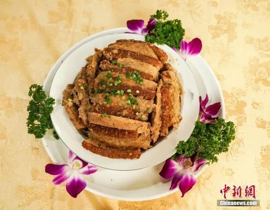 (资料图)荔浦芋扣肉。 中新社发 唐梦宪 摄 (资料图)荔浦芋扣肉。 中新社发 唐梦宪 摄