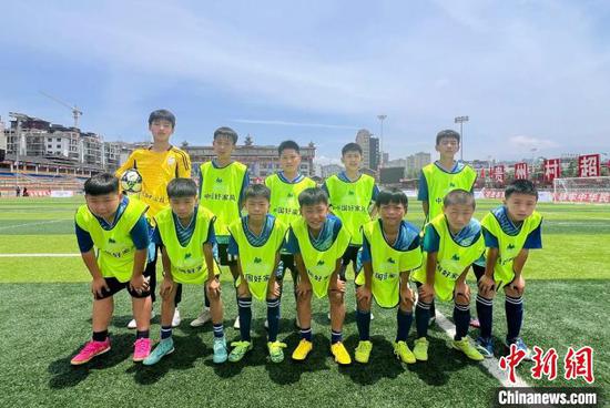 孩子们在比赛现场合影。 主办方供图 孩子们在比赛现场合影。 主办方供图