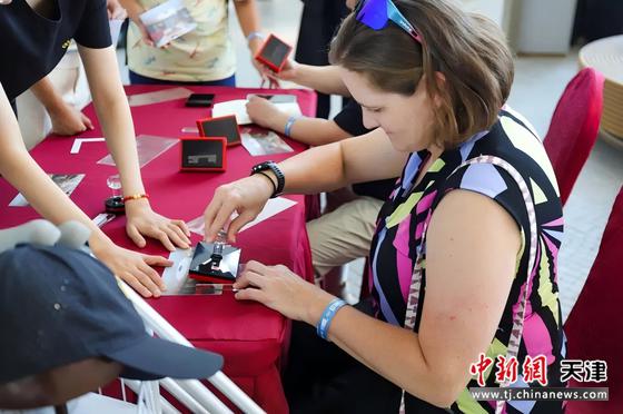 图为活动现场。（萨马兰奇纪念馆供图）