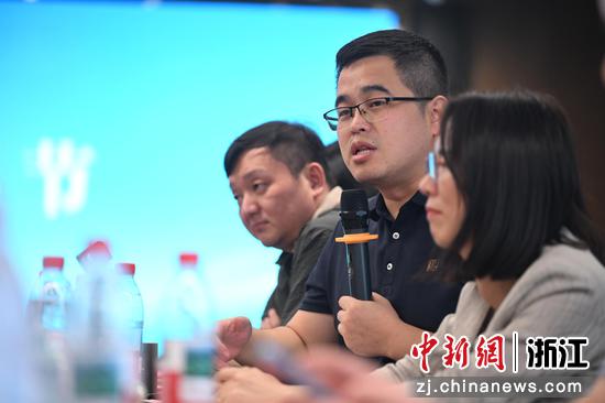 图为:与会者交流发言。中新社记者 王刚 摄 图为:与会者交流发言。中新社记者 王刚 摄