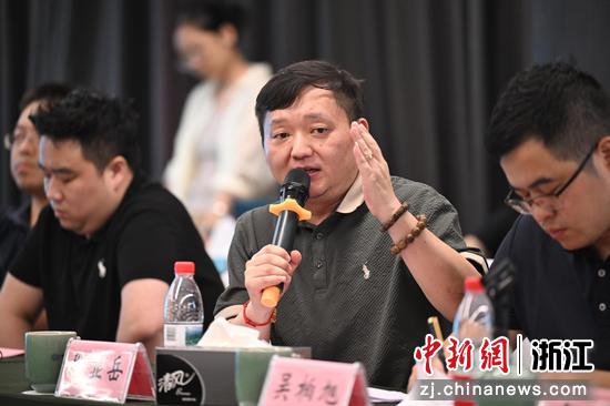 图为:与会者交流发言。中新社记者 王刚 摄 图为:与会者交流发言。中新社记者 王刚 摄