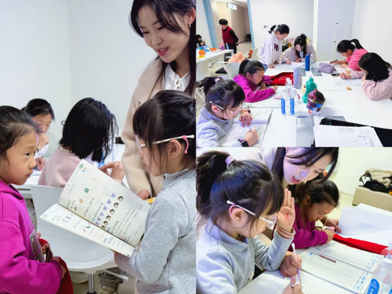 老师辅导小朋友们认真写作业。