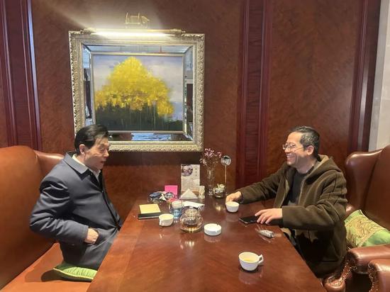 看望原社市委副主委朱友根