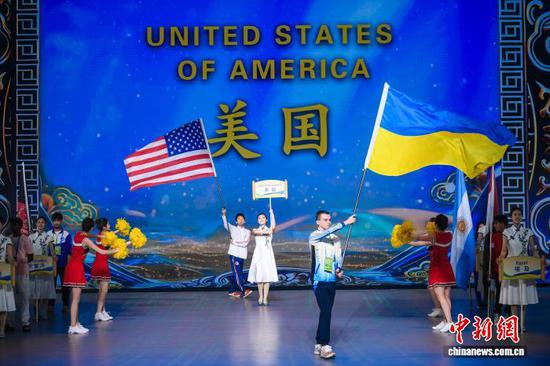 图为美国代表团入场。中新社记者 佟郁 摄 图为美国代表团入场。中新社记者 佟郁 摄