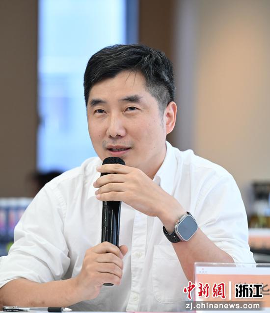 图为：微链创始人兼CEO蔡华进行分享。中新社记者 王刚 摄