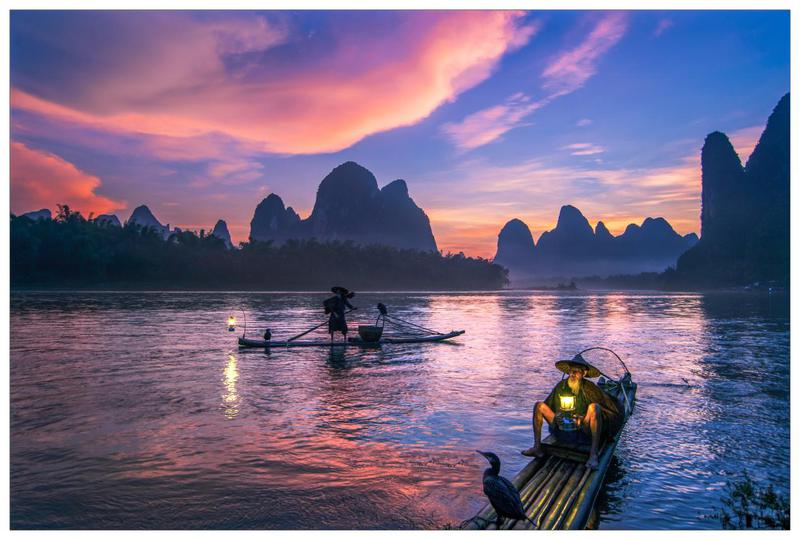 江上鸬鹚捕鱼。阳朔县文化广电体育和旅游局 供图 江上鸬鹚捕鱼。阳朔县文化广电体育和旅游局 供图