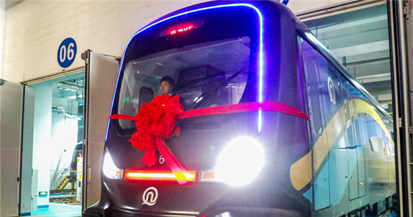 World's first carbon fiber metro train begins operation in E China