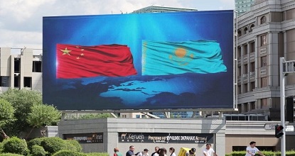 National flags of China and Kazakhstan flutter along streets of Astana