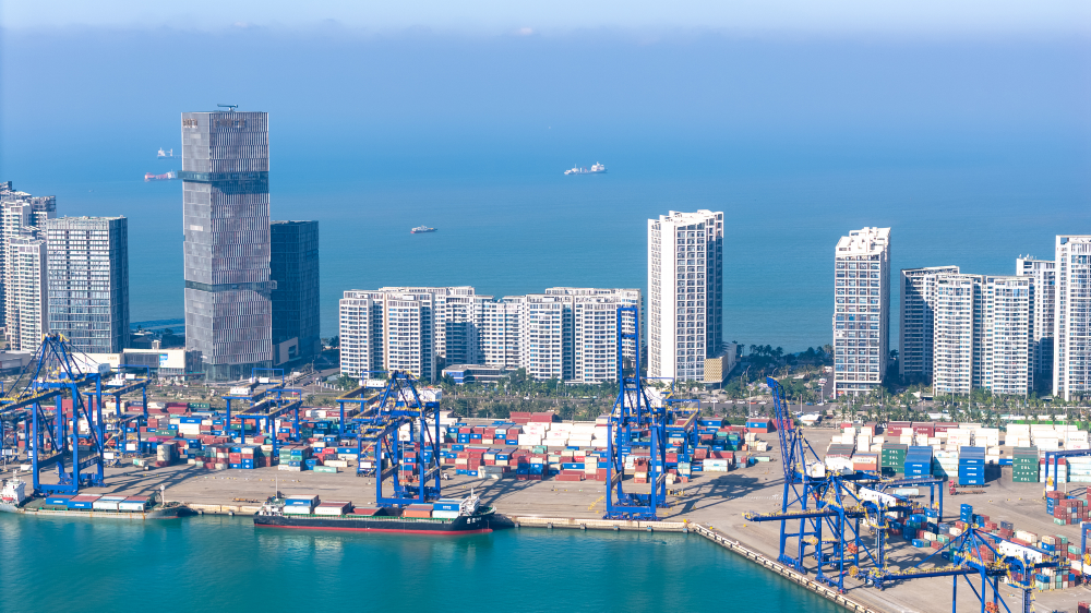 &nbsp;File photo of aerial view of Haikou Port's container terminal and skyline scenery, Hainan Province, south China. /VCG