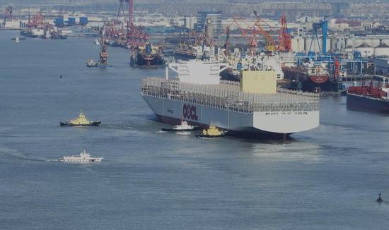 World's largest green container ship sets off for trial voyage