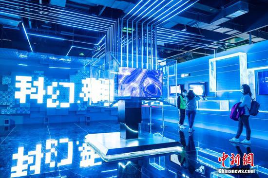 People experience metaverse technology at Shougang Park in Beijing