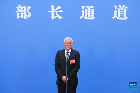 Minister of Science and Technology Wang Zhigang gives an interview after the opening meeting of the first session of the 14th National People's Congress (NPC) in Beijing, capital of China, March 5, 2023. (Xinhua/Cai Yang)