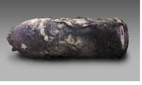 A 210-millimeter shell from the ship wreckage named Jing Yuan sunk in the First Sino-Japanese War (1894-95) during the Qing Dynasty (1644-1911) off the coast of Weihai, East China's Shandong Province, reported China's Central Television on March 4, 2023. (Photo/Screenshot from online)