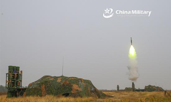 An air-defense missile system attached to a brigade under the PLA 71st Group Army launches an air-defense missile at a mock target during a field live-fire training exercise in late February, 2022. (Photo/eng.chinamil.com.cn)