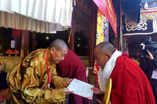 13 monks receive doctoral degree equivalent in Tibetan Buddhism