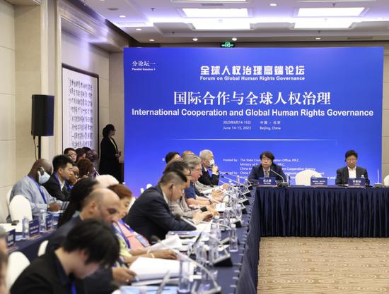 Experts hold group discussion on international cooperation at the Forum on Global Human Rights Governance in Beijing on Wednesday. (Photo by Chen Zebing/chinadaily.com.cn)