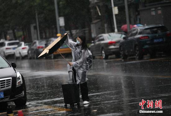 Beijing continues red alert for rainstorm