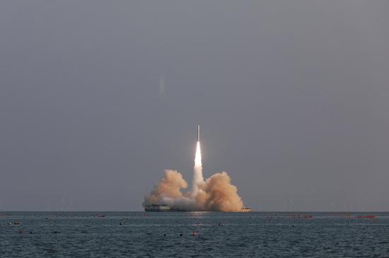 China's commercial rocket launches 4 satellites from sea for first time