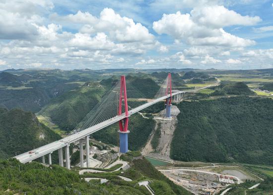 World's first alpine canyon landscape cable-stayed bridge under construction in Guizhou