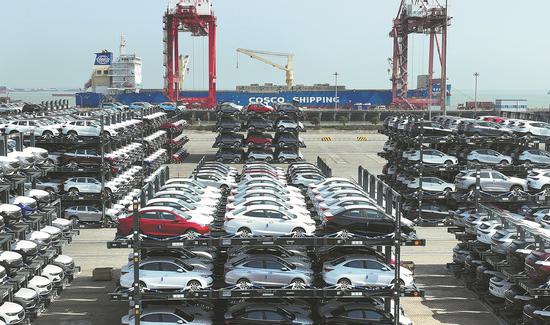 Vehicles from Chinese brands wait to be exported from a port in Suzhou, Jiangsu province. (Photo provided to China Daily)