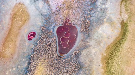 Heart-shaped Wulan Lake embedded in Tengger Desert