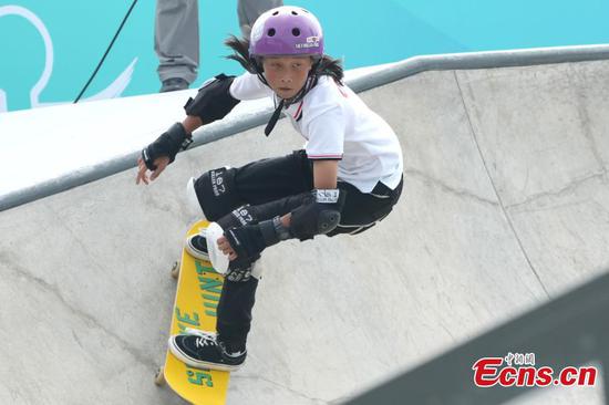 Cui Chenxi of China competes during the Women's Street Final of Skateboarding at the 19th Asian Games in Hangzhou, east China's Zhejiang Province, Sept. 27, 2023. (Photo: China News Network/Tian Bochuan)