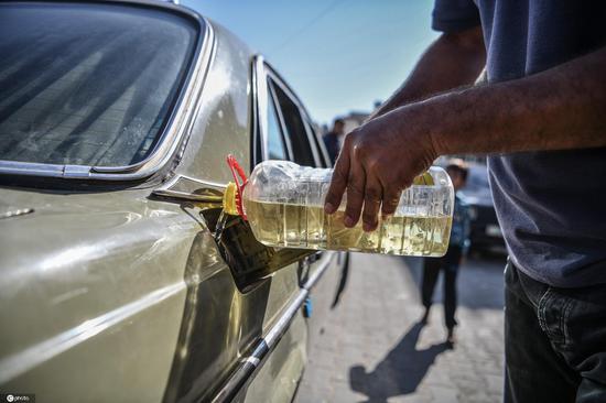 Cooking oil powers cars in petrol-starved Gaza