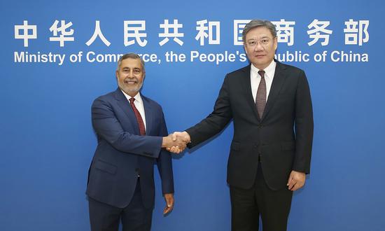 China's Minister of Commerce Wang Wentao meets with Micron CEO Sanjay Mehrotra