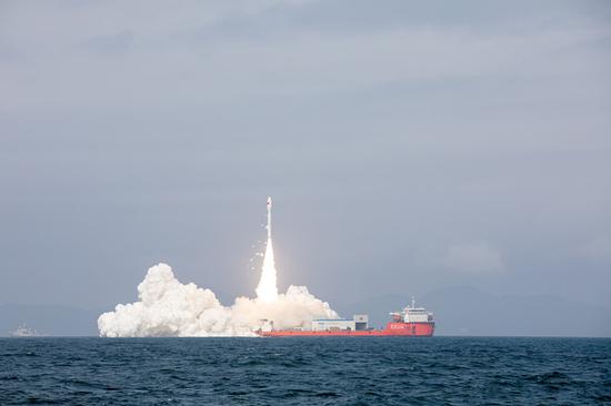 China sends 9 satellites from sea
