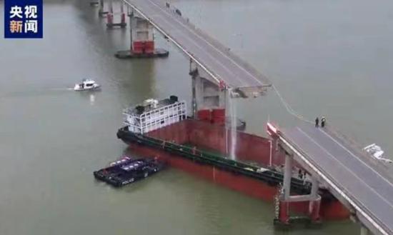 Container ship collision causes bridge collapse and bus to plunge into water in Guangzhou, killing two