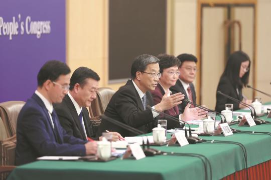 Huai Jinpeng (third from left), minister of education, speaks during a news conference on Saturday on the sidelines of the two sessions, the annual gatherings of China's top legislative and political advisory bodies, in Beijing. (PHOTO by FENG YONGBIN/CHINA DAILY)
