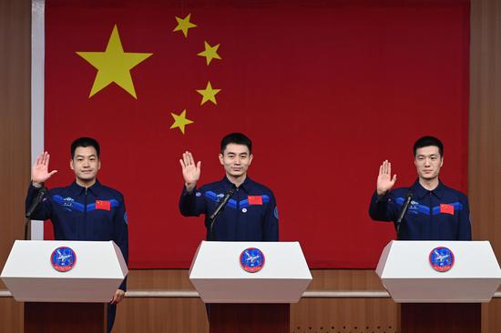 China's Shenzhou-18 crew members meet press