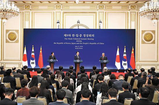 Trilateral efforts urged to embark on new journey