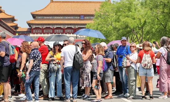 Foreign visitors flock to document incredible experiences as cross-border tourism surges