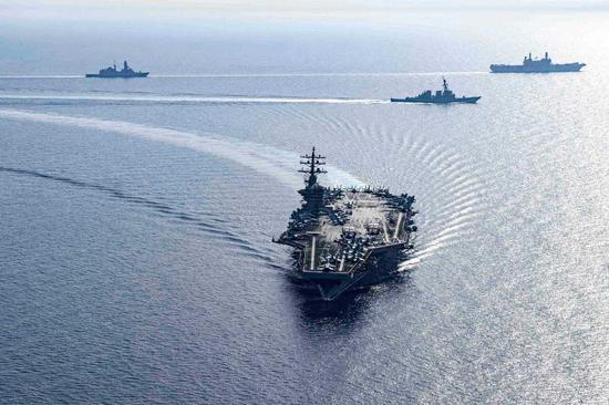 U.S. denies aircraft carrier attack claim