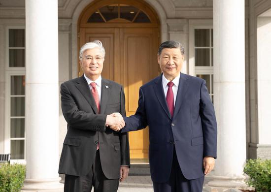 Xi and Tokayev have a cordial and friendly exchange over dinner