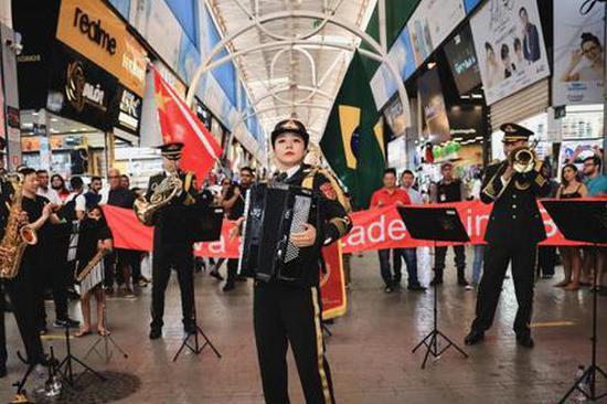 Brazilian locals and Chinese PLA band share cordiality through music