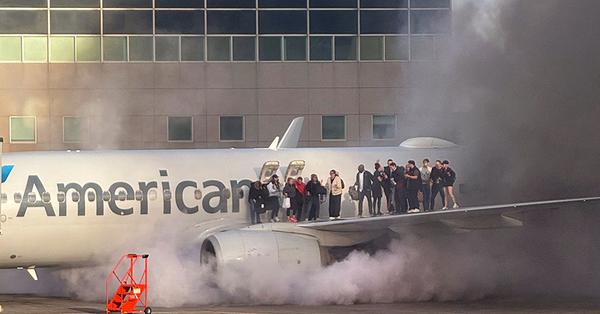 American Airlines plane catches fire at Denver airport