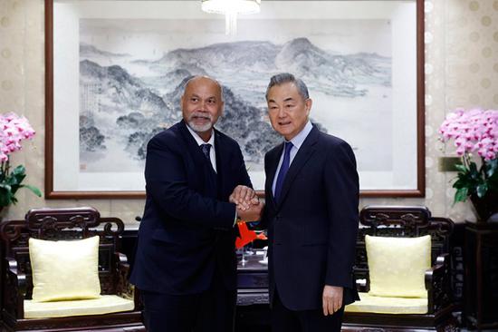 Wang Yi congratulates Nauru's opening of embassy