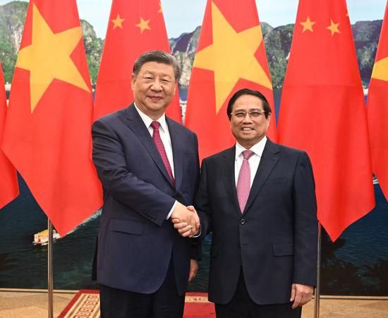 Xi calls on China, Vietnam to oppose hegemonism, unilateralism, protectionism