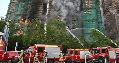 Fire engulfs Hong Kong residential blocks, killing 44 people