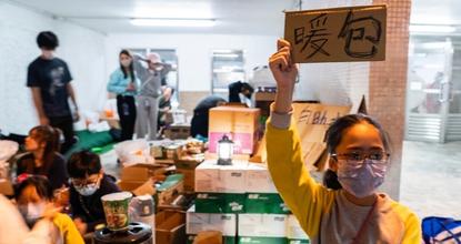 Youths assist residents affected by Hong Kong residential area fire