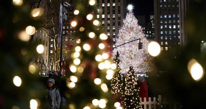 Rockefeller Center Christmas tree illuminated in New York