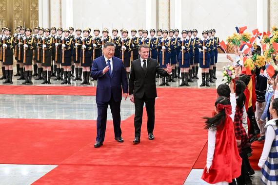 Chinese President Xi Jinping holds a welcome ceremony for French President Emmanuel Macron at the Northern Hall of the Great Hall of the People prior to their talks in Beijing, capital of China, Dec. 4, 2025. Xi held talks with Macron, who is on a state visit to China, in Beijing on Thursday. (Xinhua/Xie Huanchi)