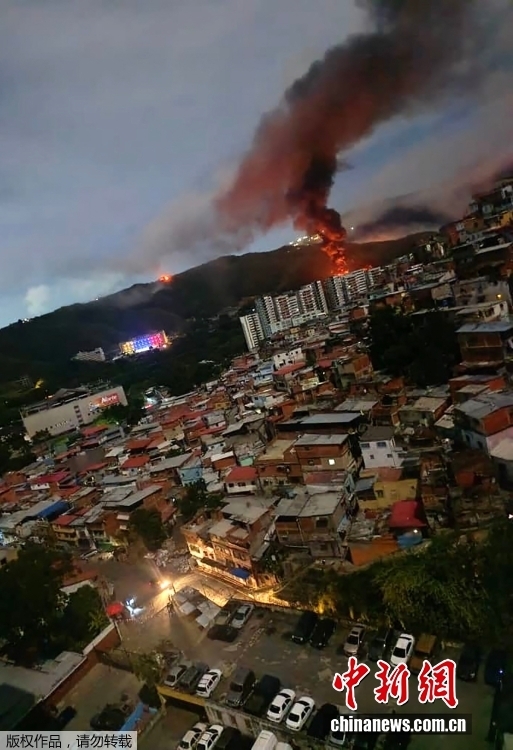 Smoke and fire rise from explosions in Caracas, Venezuela, Jan. 3, 2026. (Photo/ Agencies)
