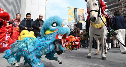 Robot dogs join Chinese New Year celebrations with festive lion dance