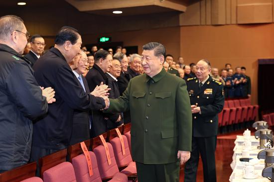 Chinese President Xi Jinping, also general secretary of the Communist Party of China Central Committee and chairman of the Central Military Commission (CMC), extends Spring Festival greetings to the country's military veterans while attending a gala held by the CMC for retired military officers of Beijing-based troops in Beijing, capital of China, Feb. 6, 2026. (Xinhua/Li Gang)